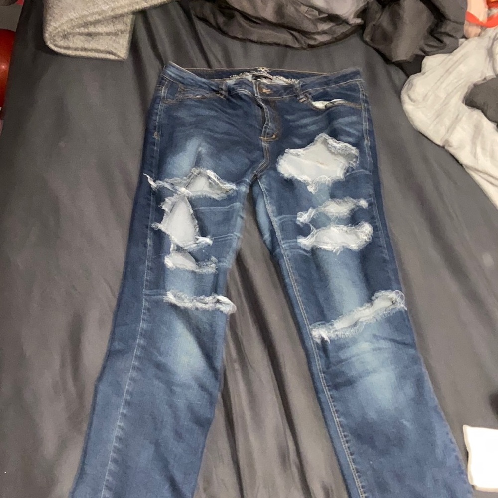Dark blue ripped jeans